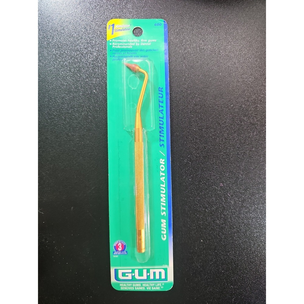 NIP BUTLER GUM G U M STIMULATOR 600 GOLD TONE METAL
